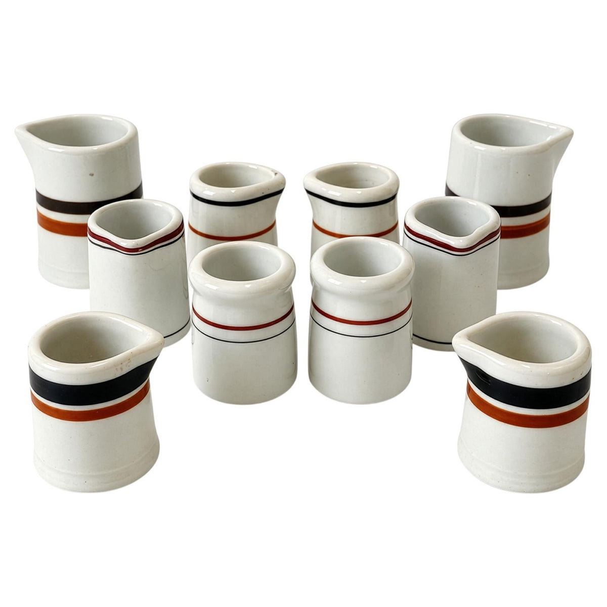 Ten White Handleless Restaurantware Creamers with Bands and Lines