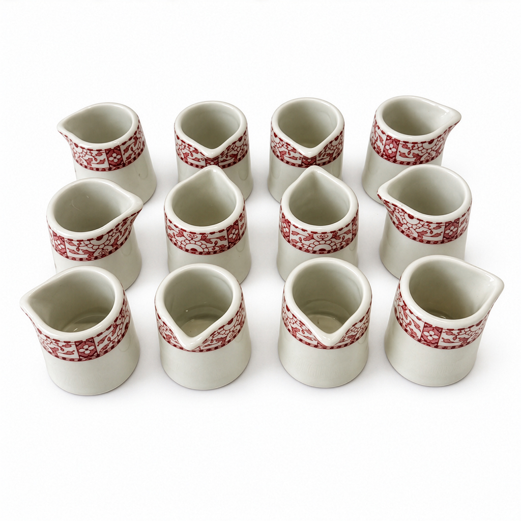 Set of Twelve Warwick Restaurantware Creamers with Red Borders