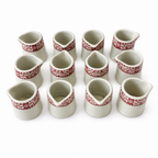 Set of Twelve Warwick Restaurantware Creamers with Red Borders