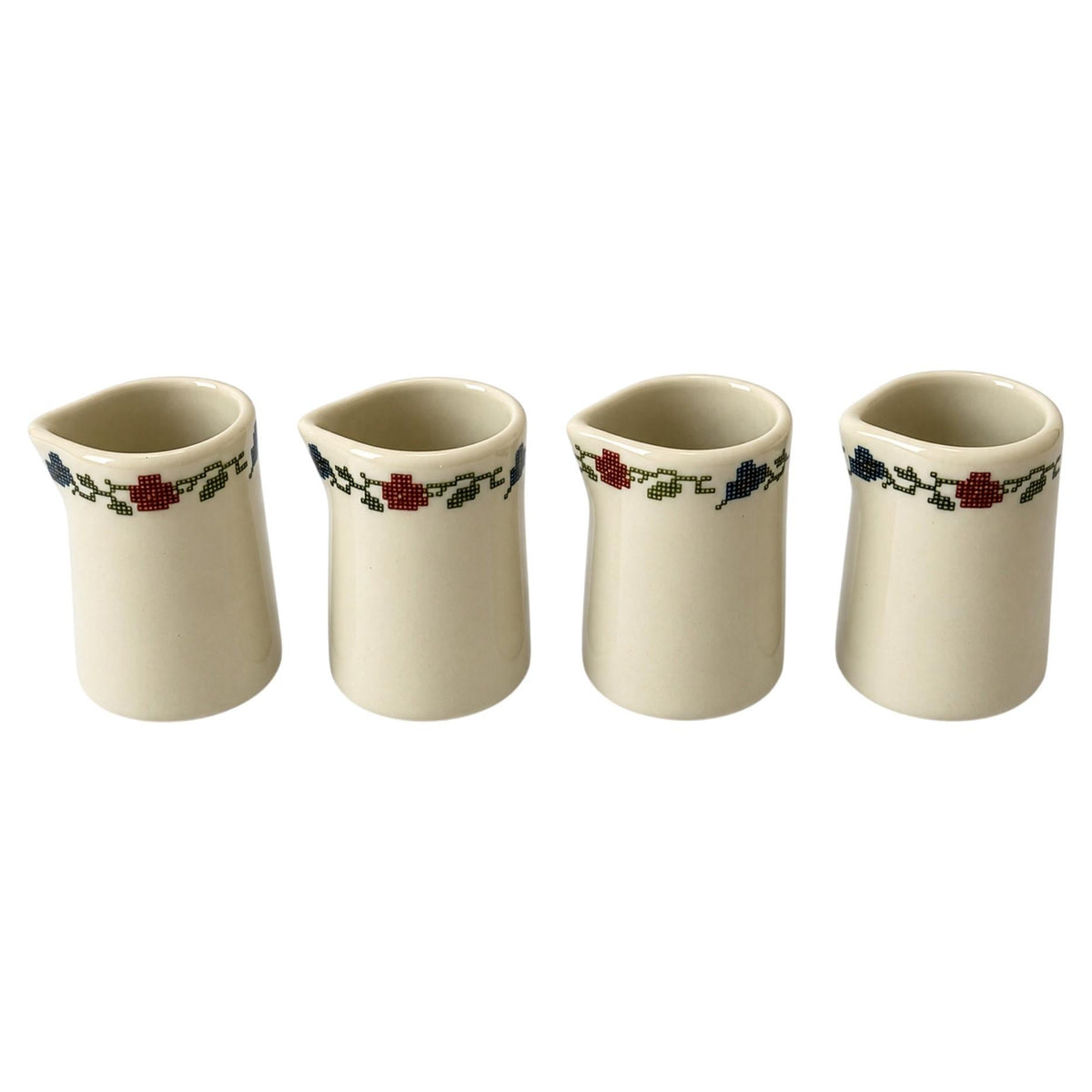 Set of Four Shenango Ivory Creamers, Needlepoint Design