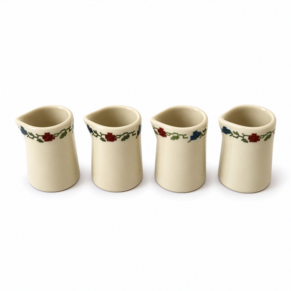 Set of Four Shenango Ivory Creamers, Needlepoint Design