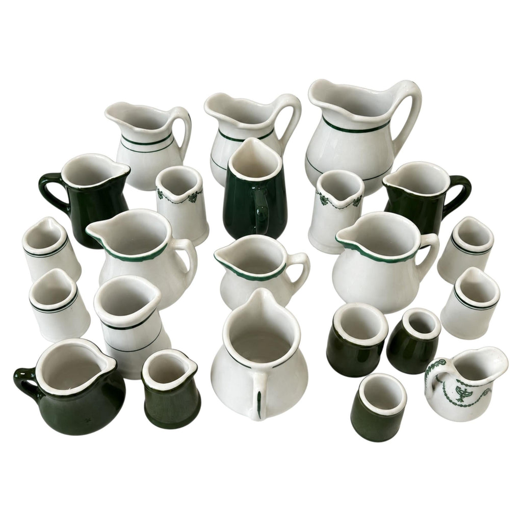 Collection of 24 Green and White Restaurantware Creamers