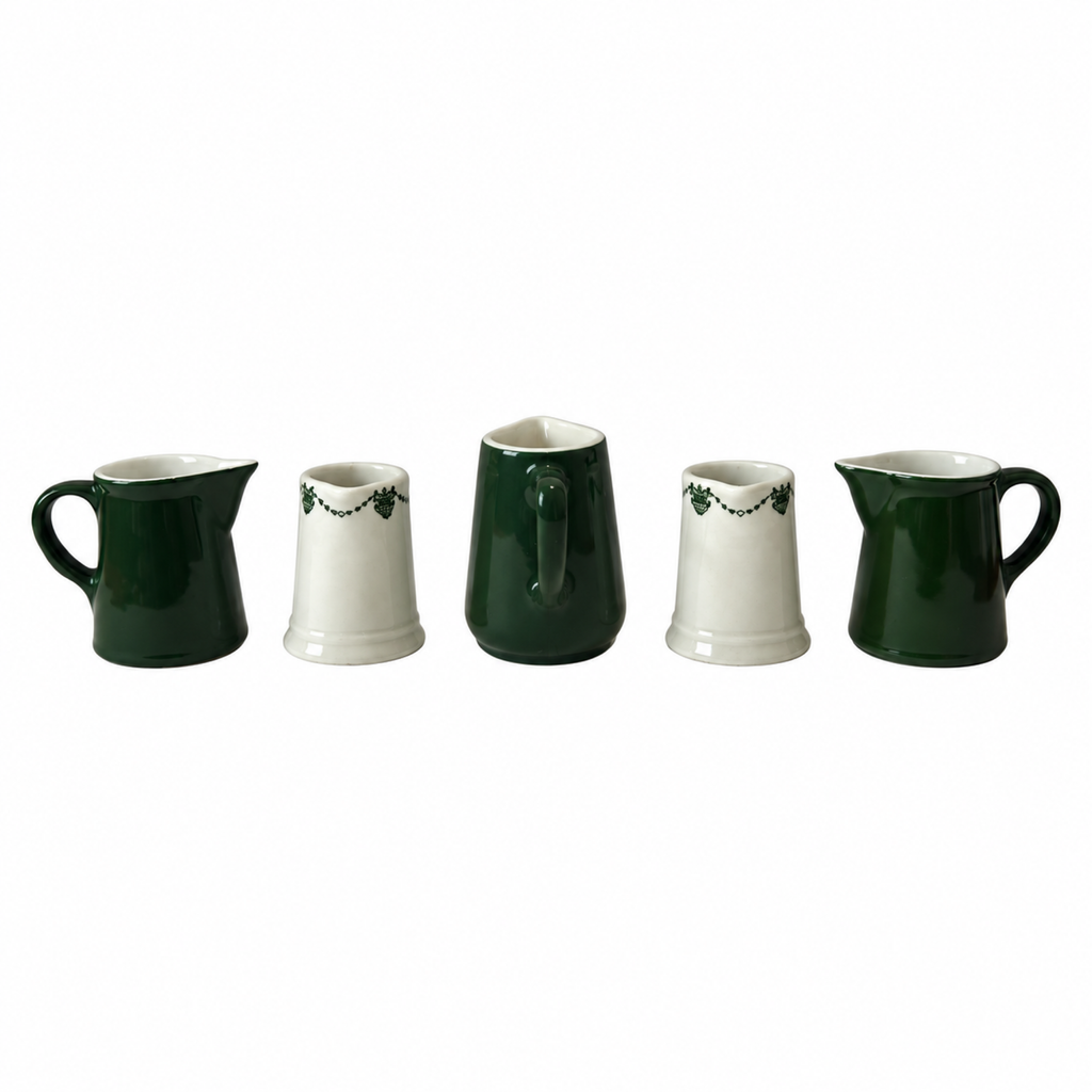 Collection of 24 Green and White Restaurantware Creamers