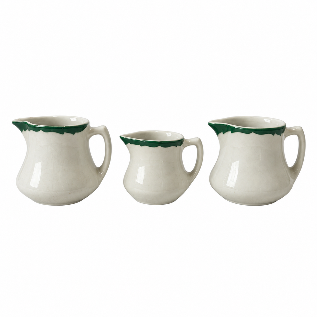 Collection of 24 Green and White Restaurantware Creamers