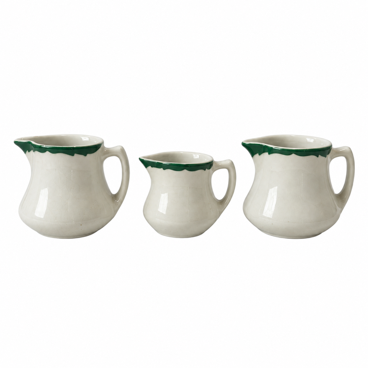 Collection of 24 Green and White Restaurantware Creamers