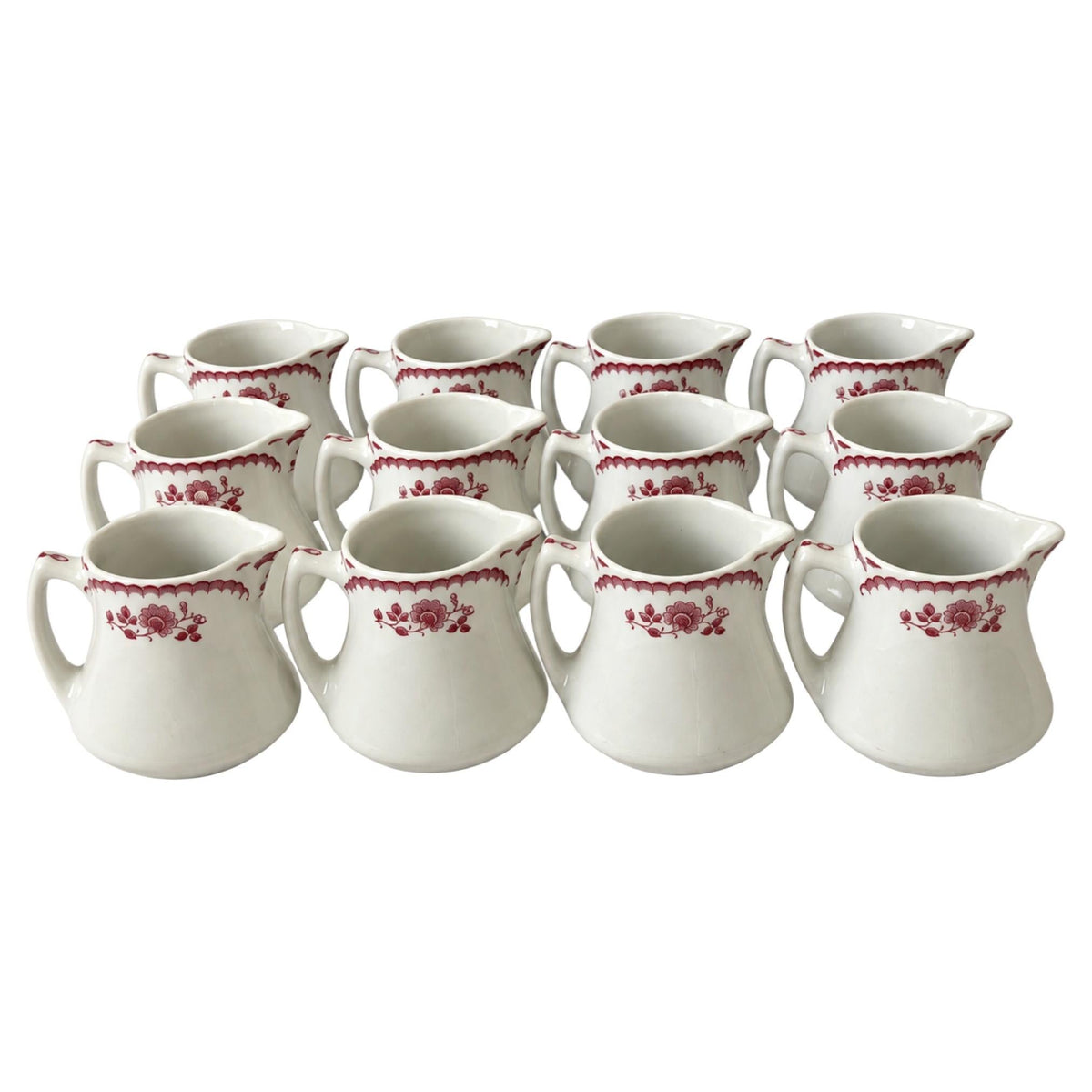Collection of 12 Shenango China Creamers in the Chardon Rose Red Pattern