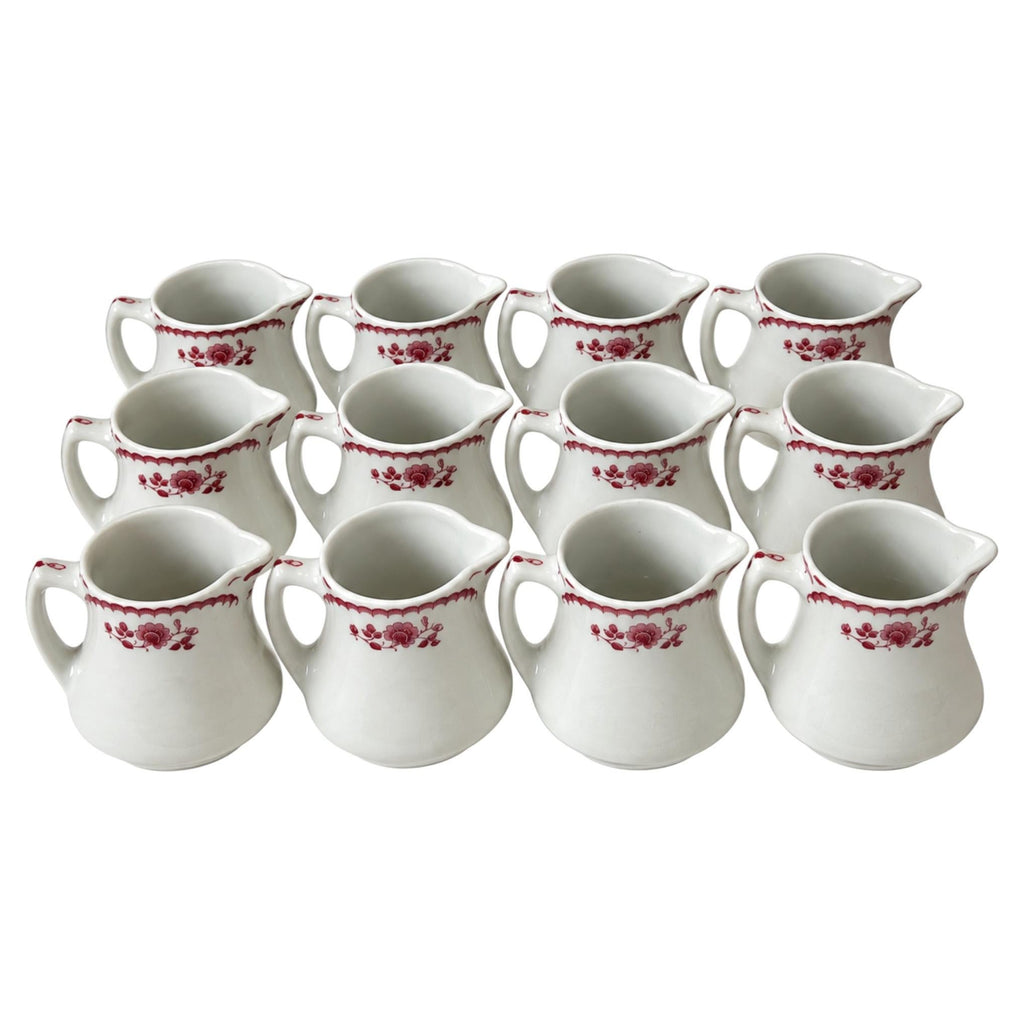 Collection of 12 Shenango China Creamers in the Chardon Rose Red Pattern