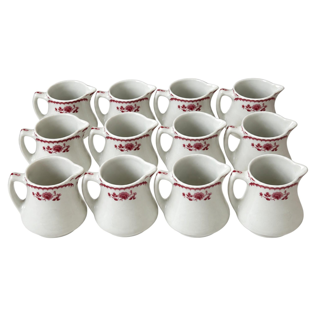 Collection of 12 Shenango China Creamers in the Chardon Rose Red Pattern
