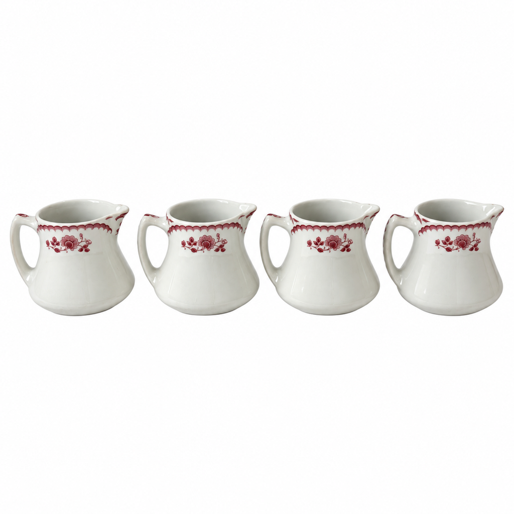Collection of 12 Shenango China Creamers in the Chardon Rose Red Pattern