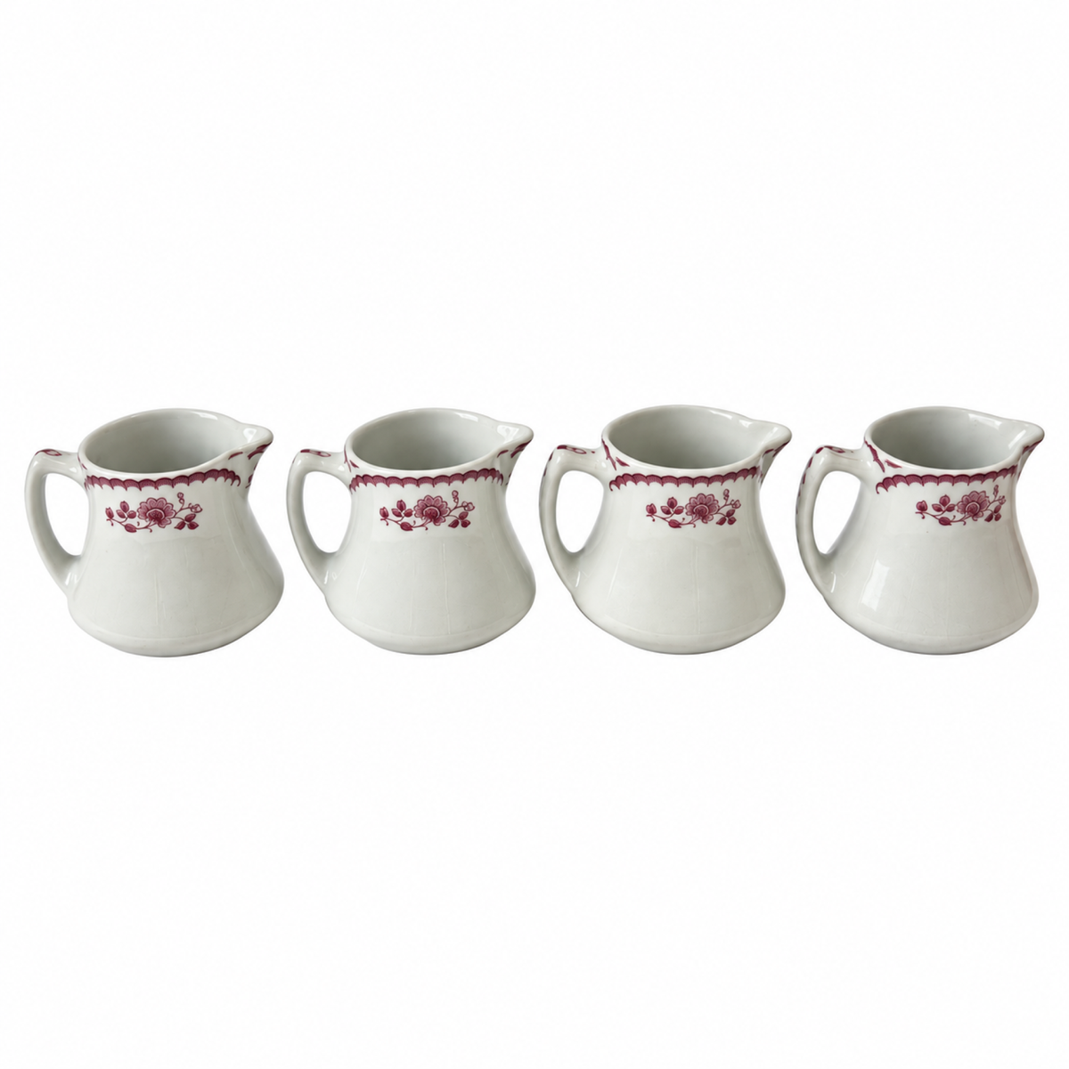Collection of 12 Shenango China Creamers in the Chardon Rose Red Pattern