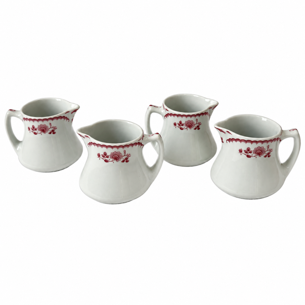 Collection of 12 Shenango China Creamers in the Chardon Rose Red Pattern