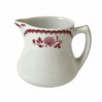 Collection of 12 Shenango China Creamers in the Chardon Rose Red Pattern