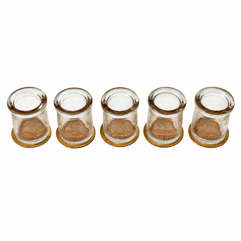 Collection of 27 Clear Glass Creamers with Maple City Dairy Caps