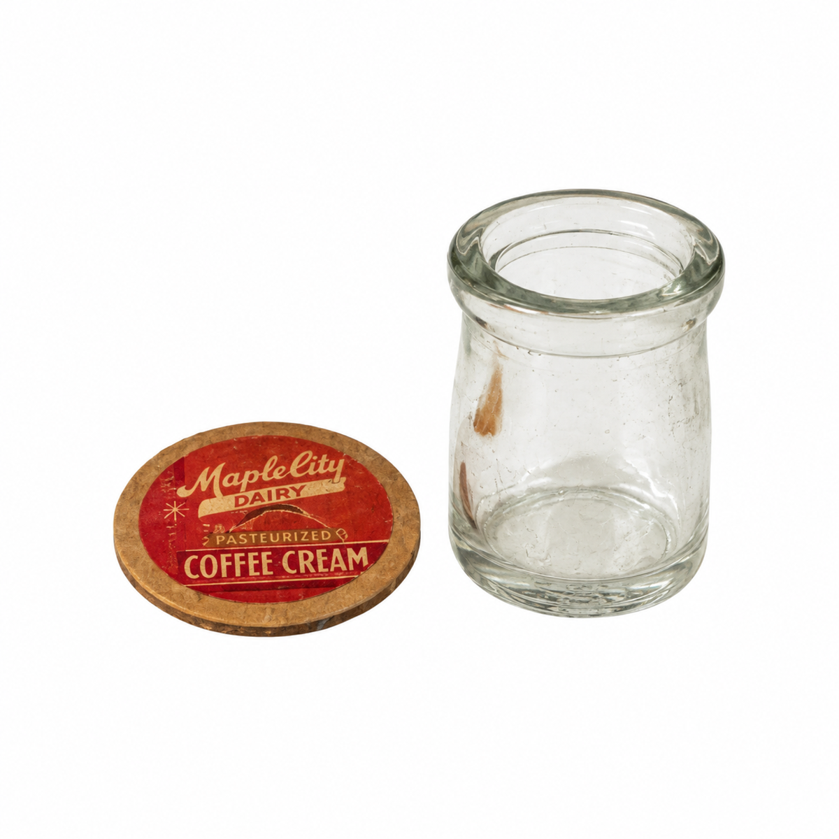Collection of 27 Clear Glass Creamers with Maple City Dairy Caps