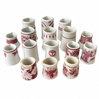 Collection of 19 Handleless Restaurantware Creamers in White and Red