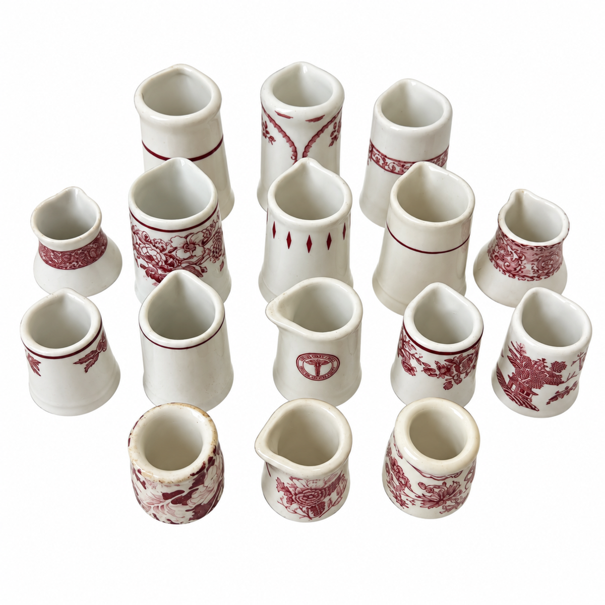 Collection of 19 Handleless Restaurantware Creamers in White and Red