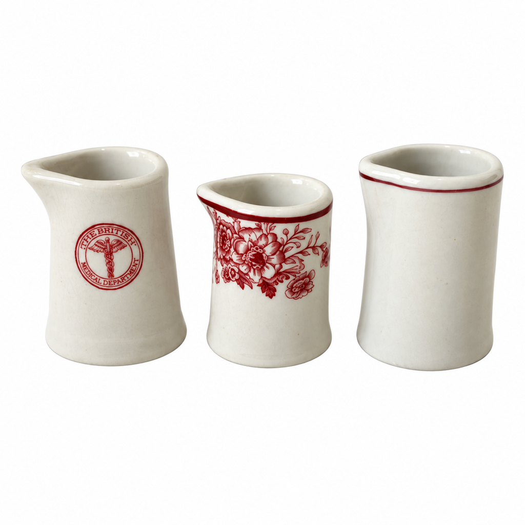 Collection of 19 Handleless Restaurantware Creamers in White and Red