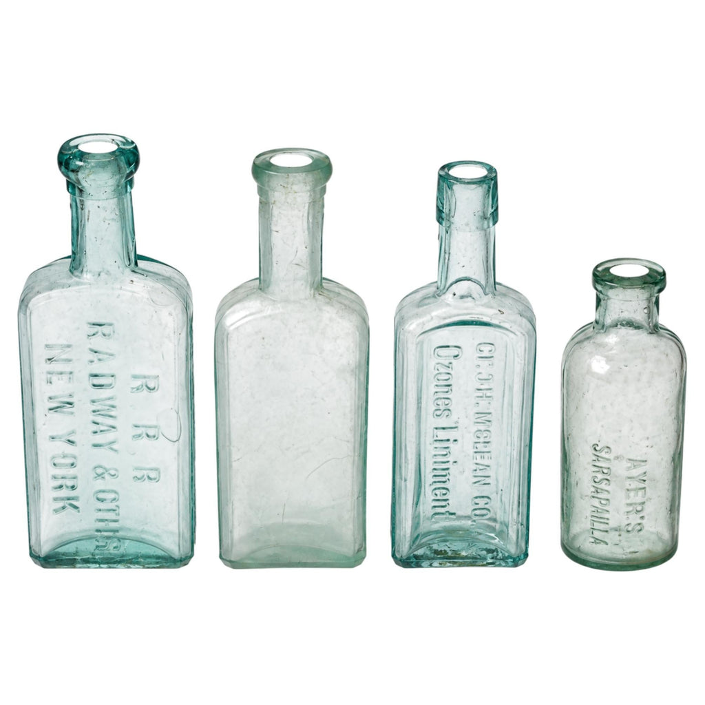 Set of Four Antique American Medicine Bottles in Aqua Glass