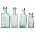Set of Four Antique American Medicine Bottles in Aqua Glass