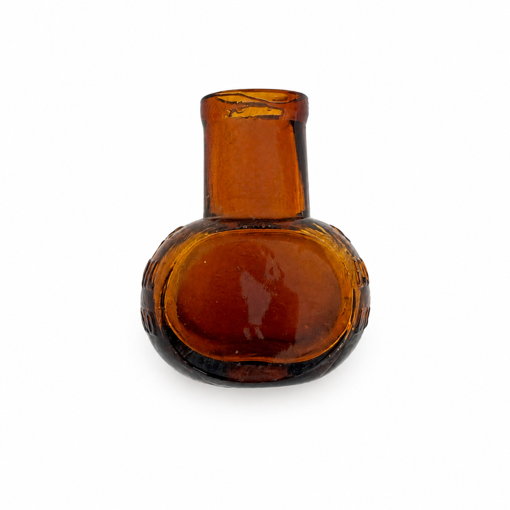 Collection of 8 Antique Bovril Amber Glass Bottles