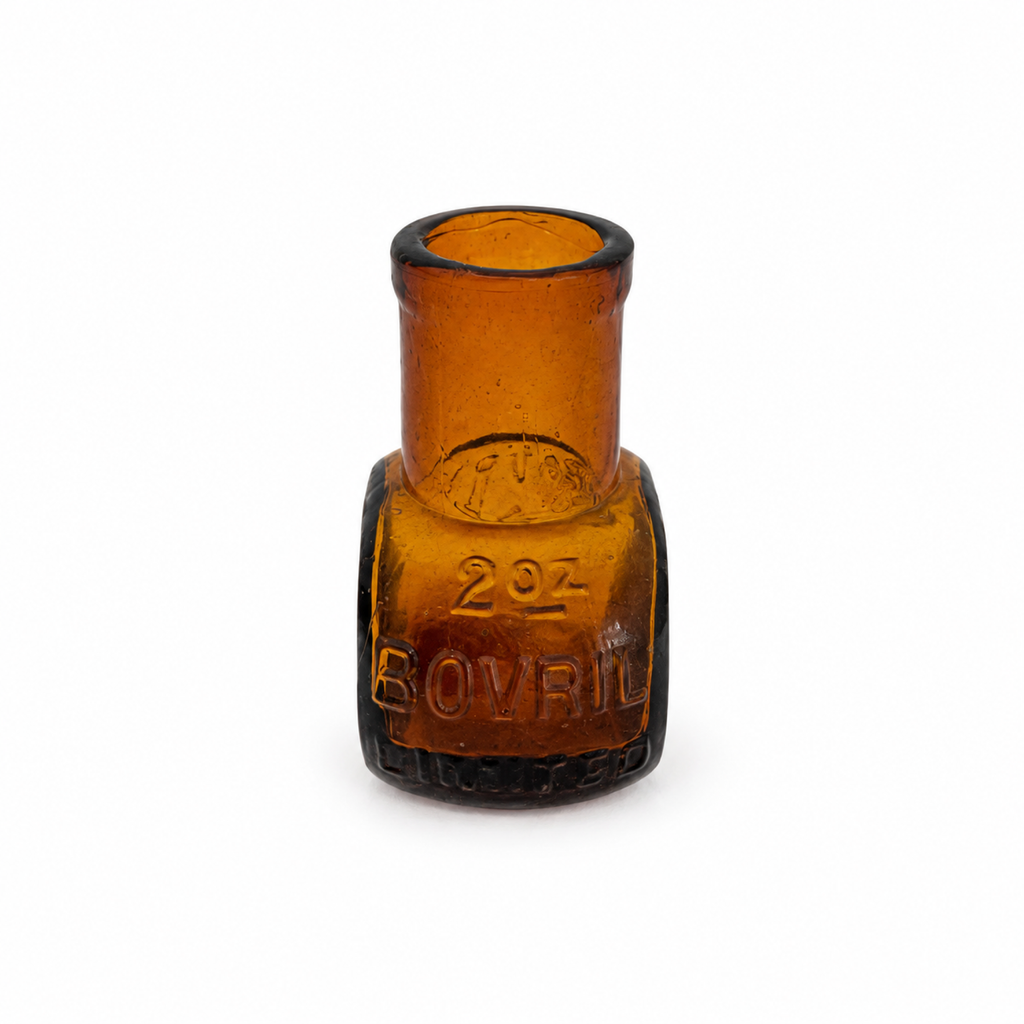 Collection of 8 Antique Bovril Amber Glass Bottles