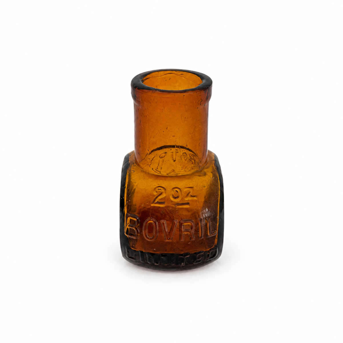 Collection of 8 Antique Bovril Amber Glass Bottles