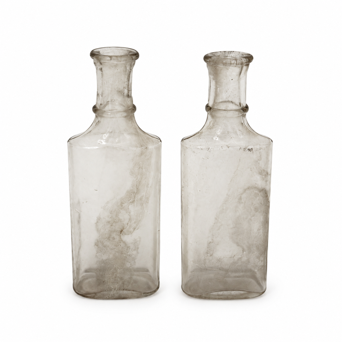 Collection of 24 Early 20th-Century Clear Glass Apothecary and Laboratory Bottles