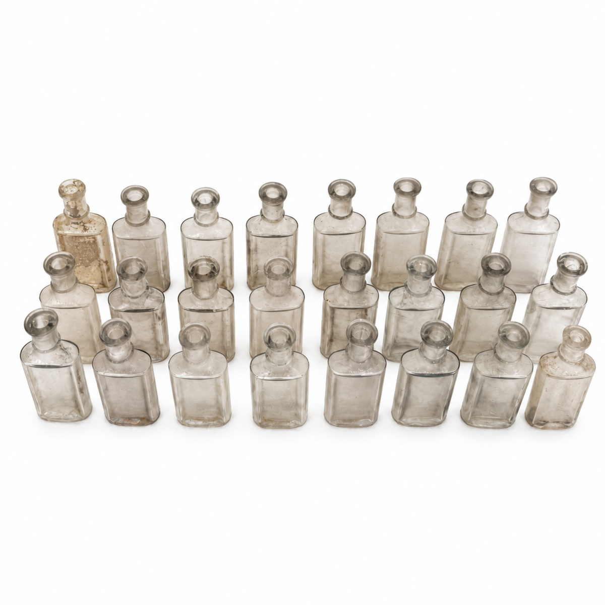 Collection of 24 Early 20th-Century Clear Glass Apothecary and Laboratory Bottles