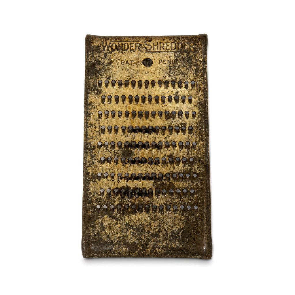 Wall Installation of Eleven Antique and Vintage Metal Kitchen Graters — image 3