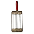 Wall Installation of Eleven Antique and Vintage Metal Kitchen Graters — image 4