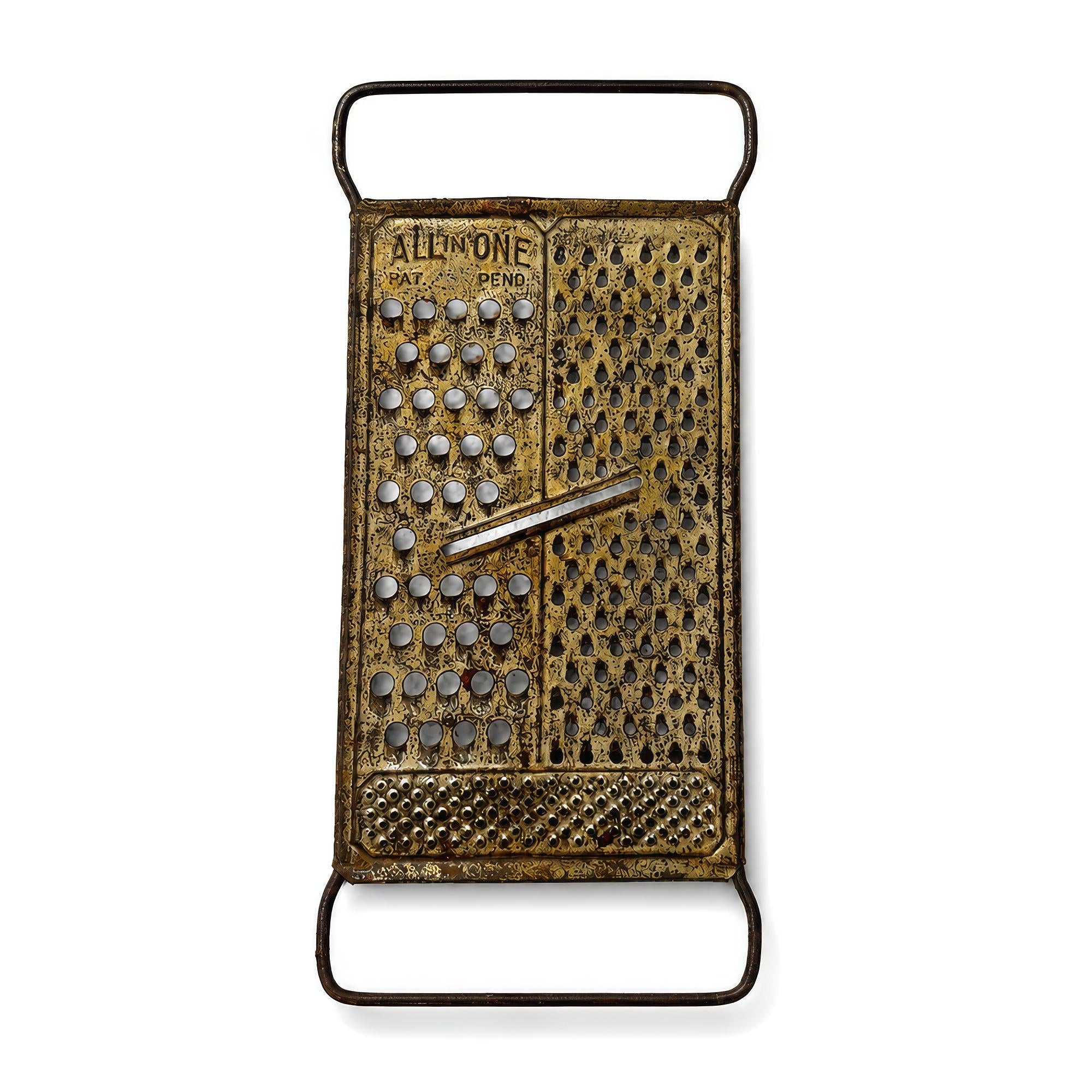 Wall Installation of Eleven Antique and Vintage Metal Kitchen Graters — image 7