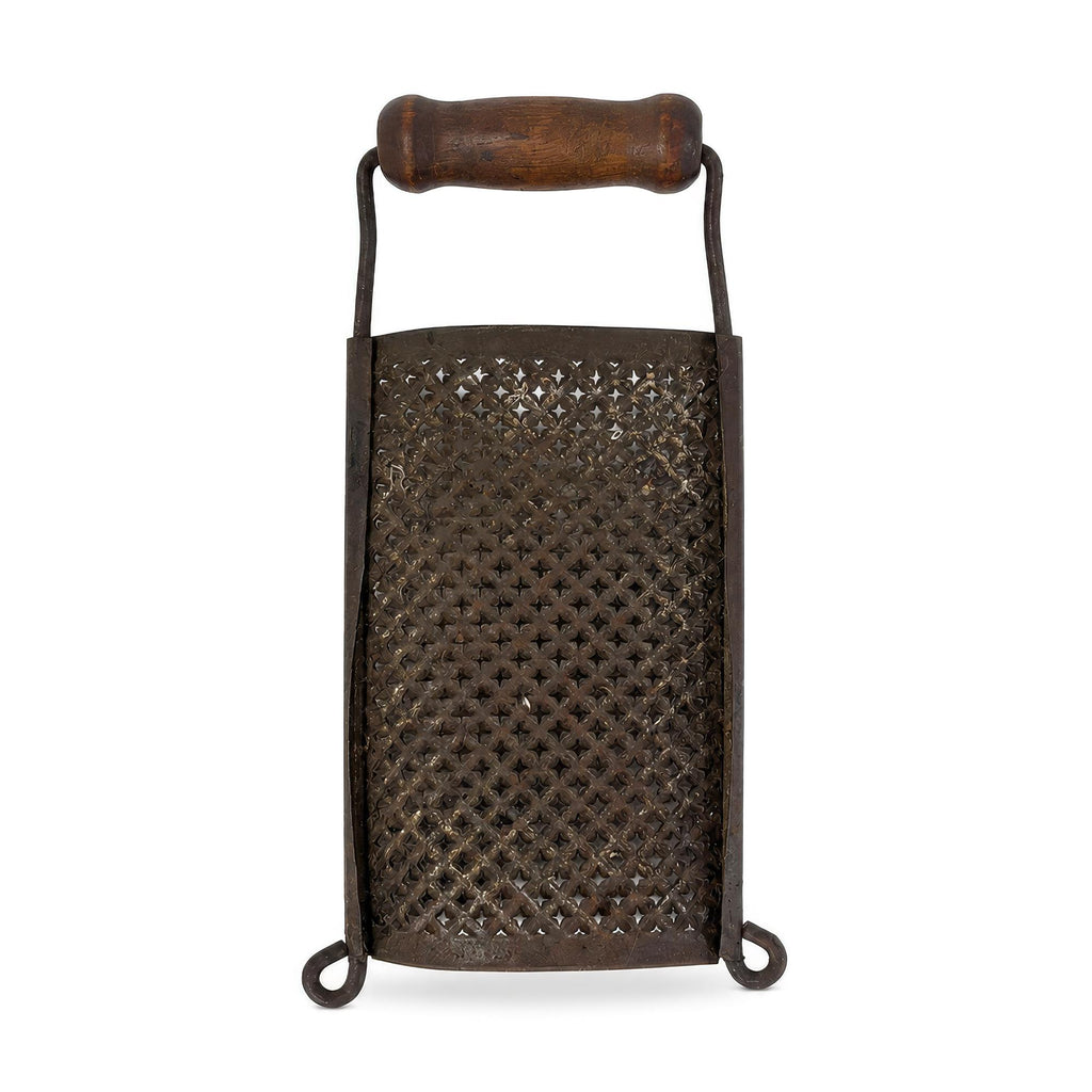 Wall Installation of Eleven Antique and Vintage Metal Kitchen Graters — image 9
