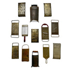 Wall Installation of Thirteen Antique and Vintage Metal Kitchen Graters