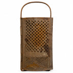 Wall Installation of Thirteen Antique and Vintage Metal Kitchen Graters
