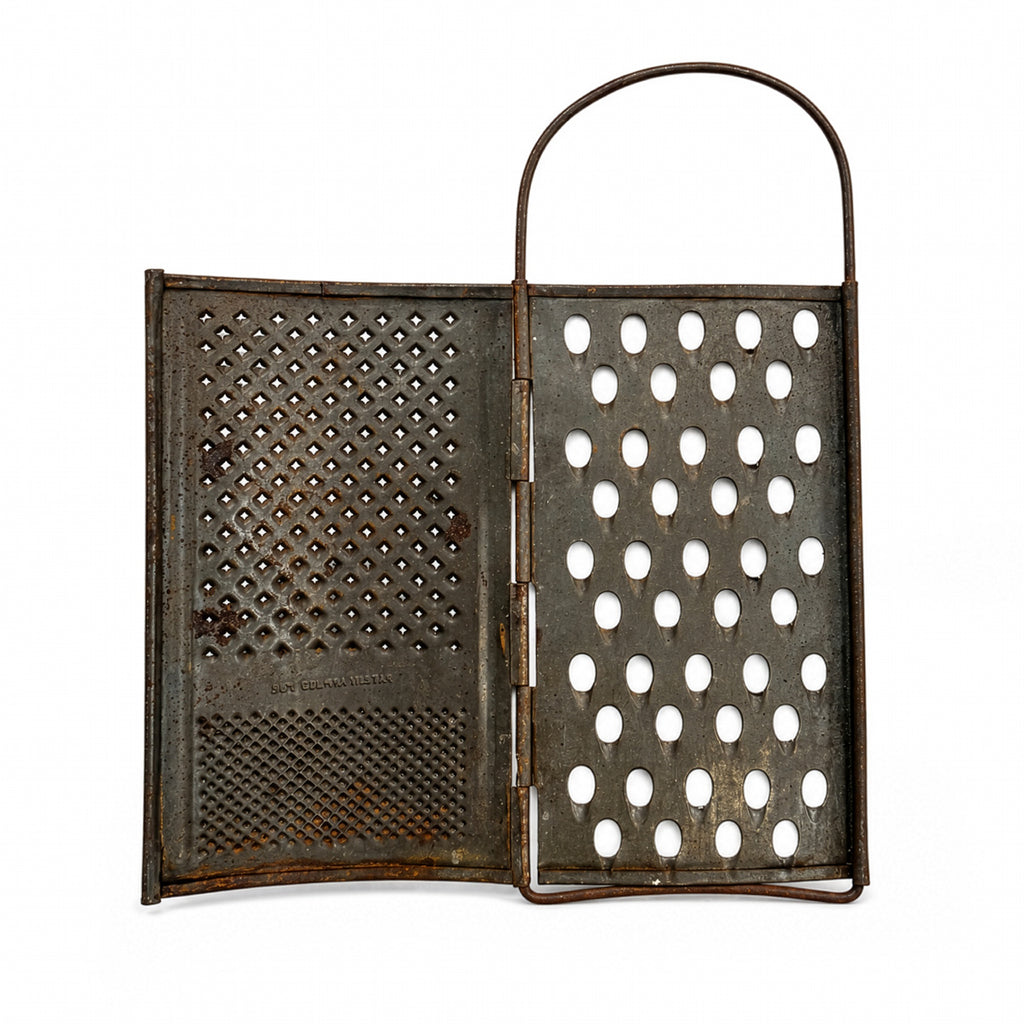Wall Installation of Thirteen Antique and Vintage Metal Kitchen Graters