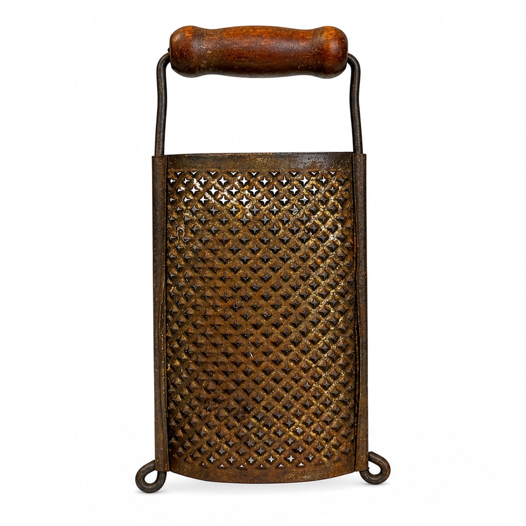 Wall Installation of Thirteen Antique and Vintage Metal Kitchen Graters