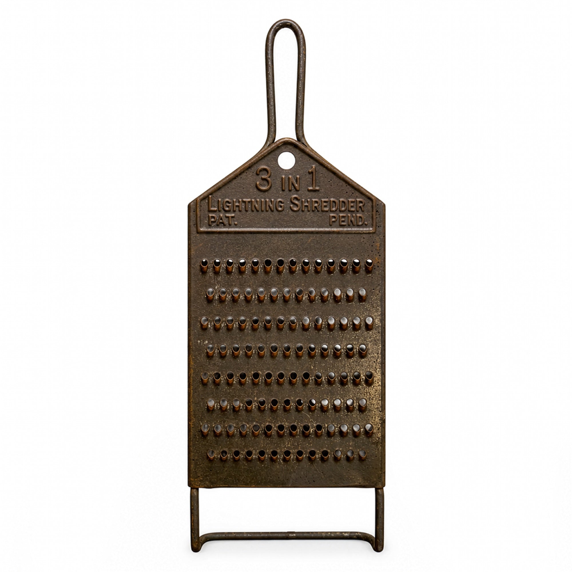Wall Installation of Thirteen Antique and Vintage Metal Kitchen Graters