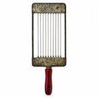 Wall Installation of Thirteen Antique and Vintage Metal Kitchen Graters