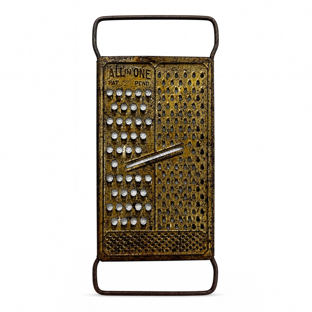 Wall Installation of Thirteen Antique and Vintage Metal Kitchen Graters