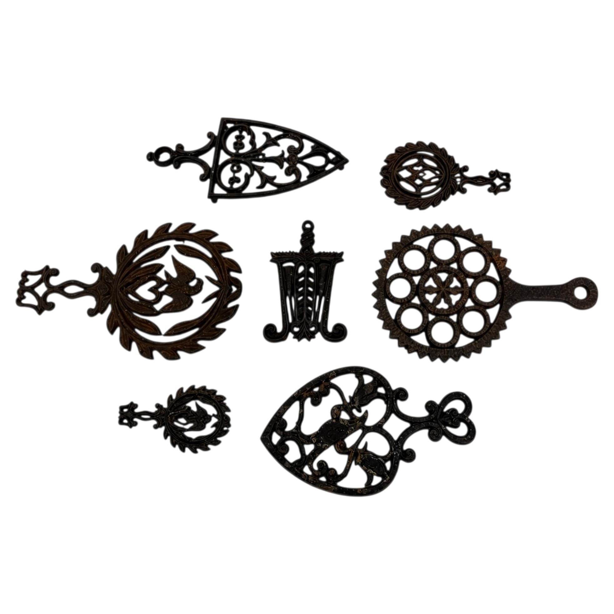 Set of 7 Vintage Cast Iron Wall Sculptures, Decorative Trivets