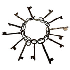 Set of 13 Antique Iron Skeleton Keys on Keeper's Ring, circa 1900
